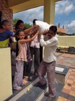 Foodgrain distribution at Anandwadi families